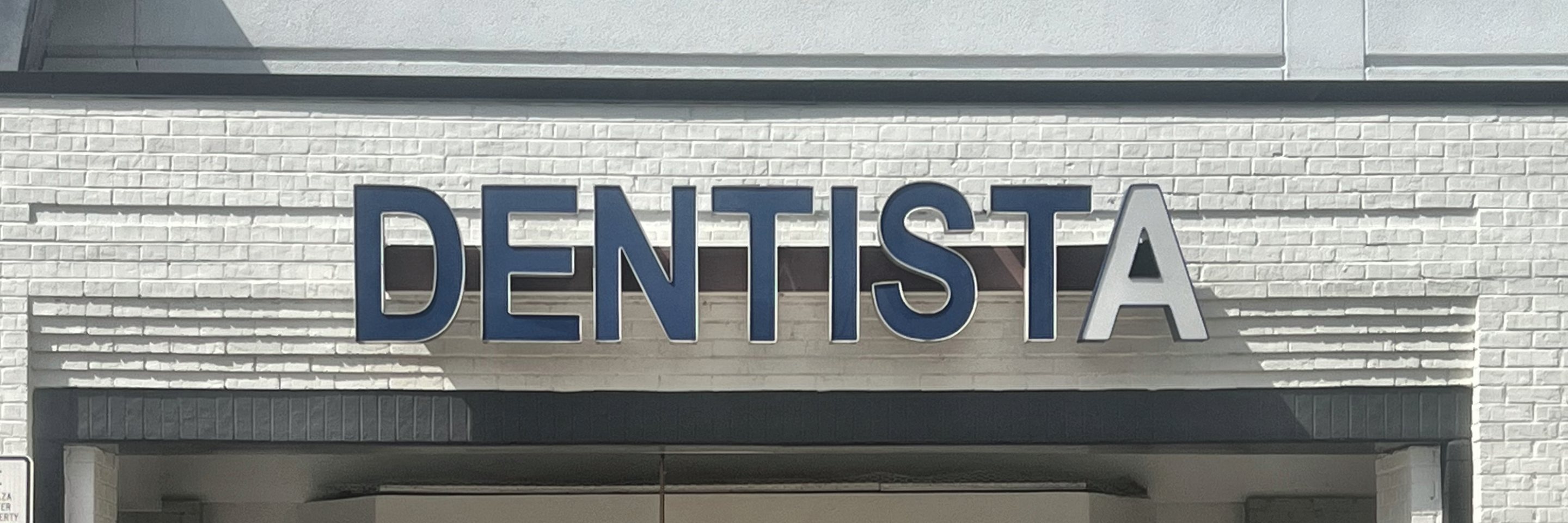 The J. Griffiths Dentistry storefront in Northeast Plaza on Buford Highway, Brookhaven, Georgia